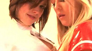 Two naughty nurses playing with their big tits